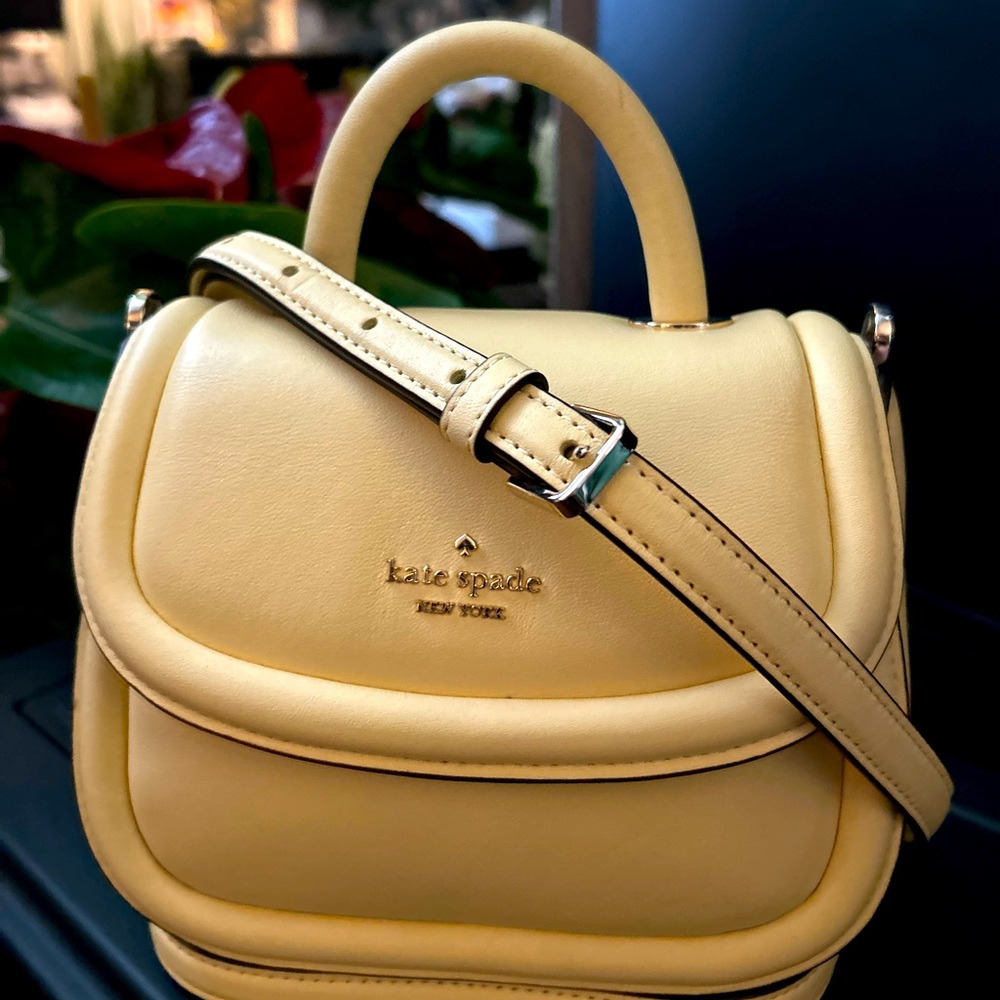 Kate Spade Cream Mini Bag with Structured Design and Silver Hardware
